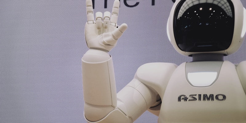 Asimo robot doing handsign