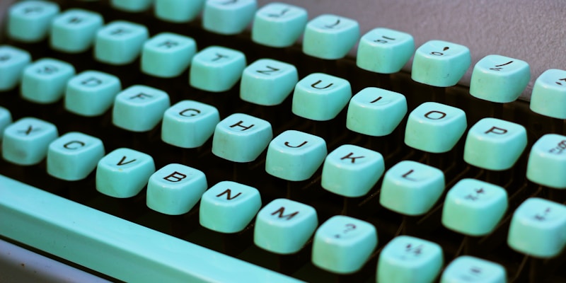 teal and black typewriter